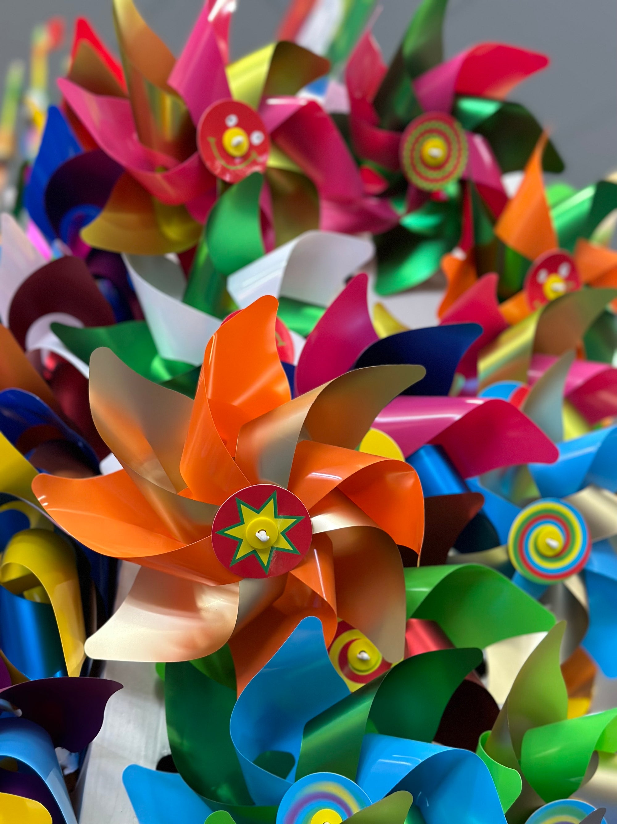 Colourful Rainbow Windmill On A Stick